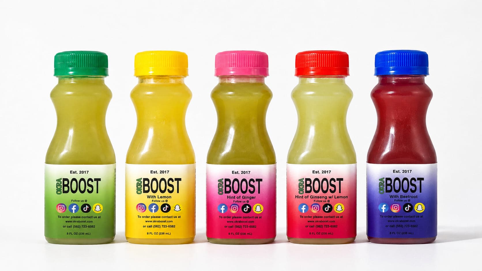 All five OkraBoost flavors — Original, Lemon, Ginger, Beetroot, and Ginseng-Lemon — arranged together on a clean near-white background