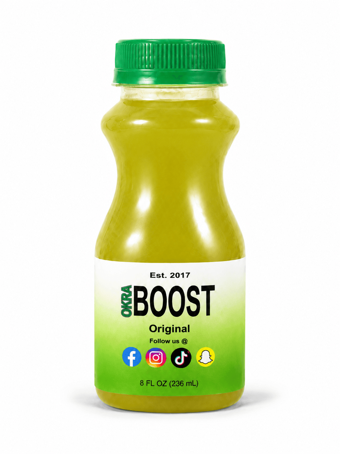 Okra Boost Original: green-cap bottle of greenish-yellow blended okra, clean white studio backdrop